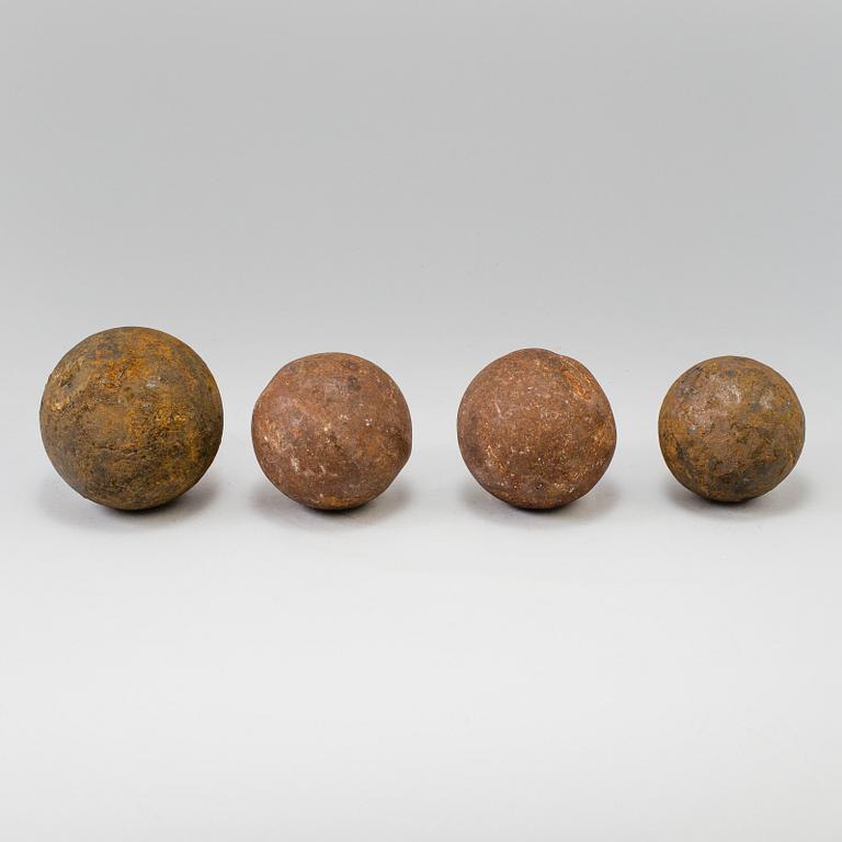 FOUR CAST IRON CANON BALLS, possibly 18th century.