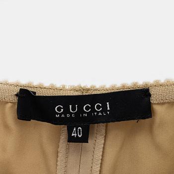 Gucci, a pair of silk pants, size 40.