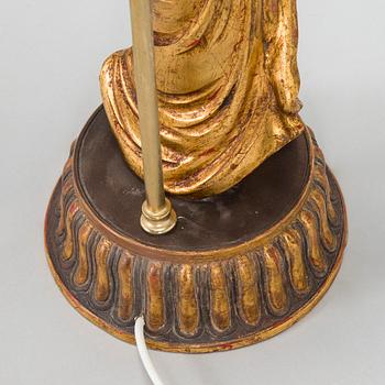 A pair of table lamps with Asian figures, later half of 20th century.