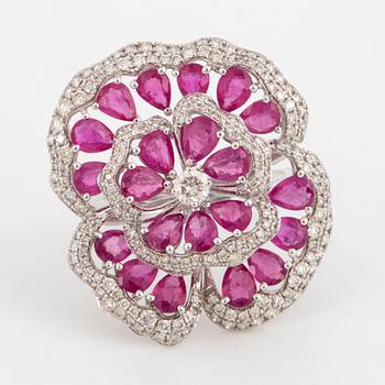 Ruby and brilliant-cut diamond flower ring.