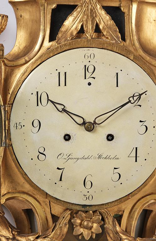 A Gustavian giltwood cartel clock by O. Ljundahl (watchmaker in Stockholm 1775-80).
