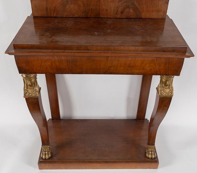 A Swedish Empire mirror and console table, first half of the 19th century.
