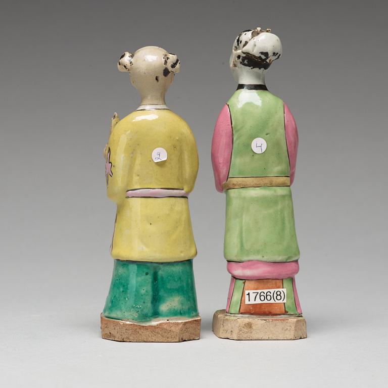 A group of eight famille rose figurines, Qing dynasty, 19th Century.