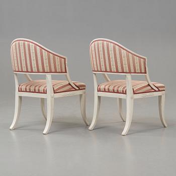 A pair of late Gustavian early 19th century armchairs.