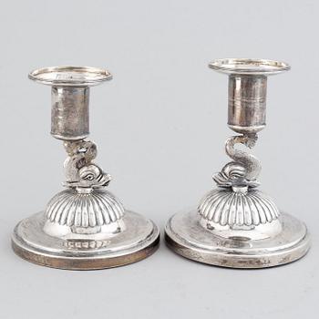 A pair of swedish silver empire candlesticks, mark of Johan Petter Grönvall, Stockholm 1830.