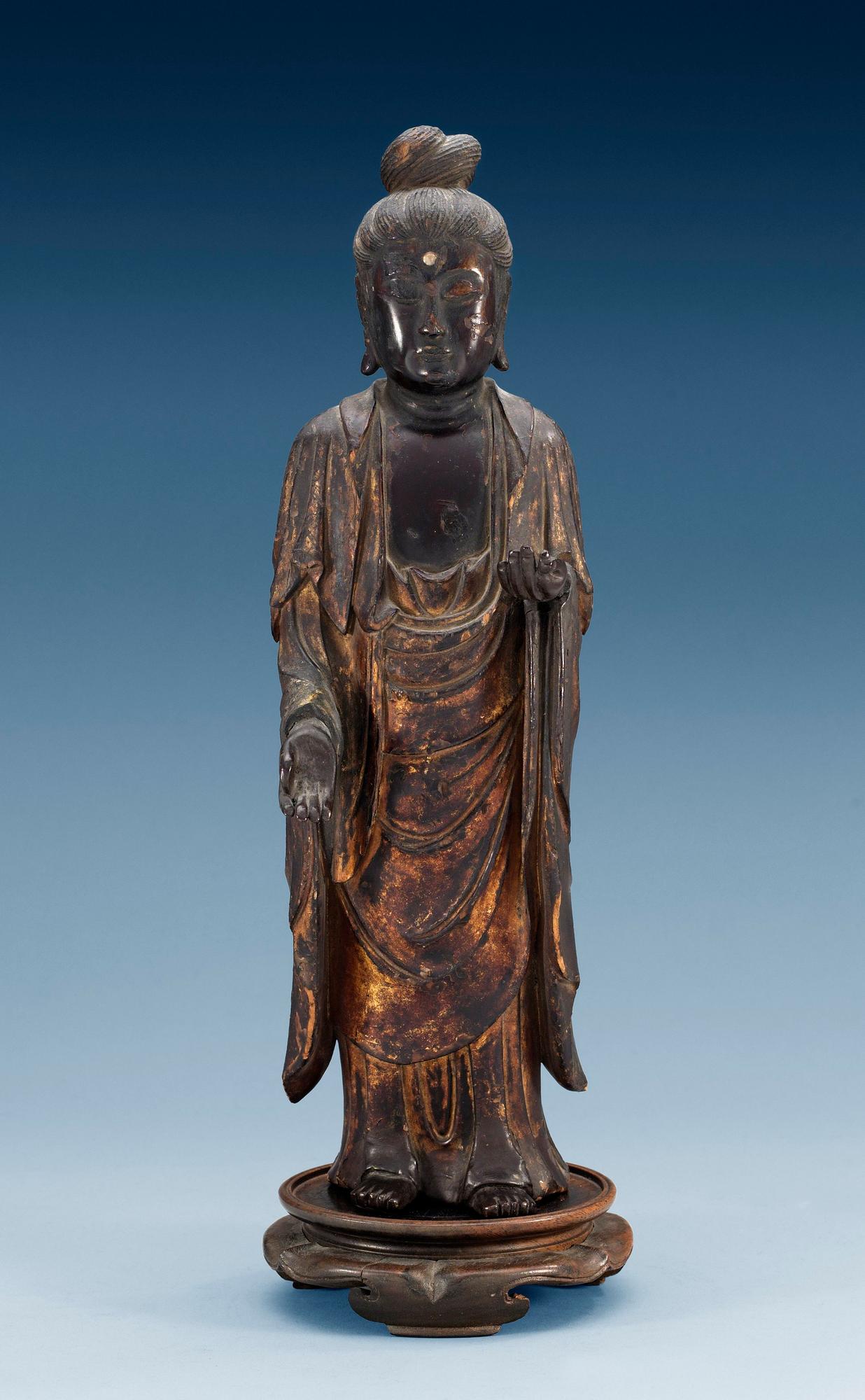 A Japanese lacquered wooden figure of Kannon Bosatsu, Muromachi/Momoyama period, 16th Century.