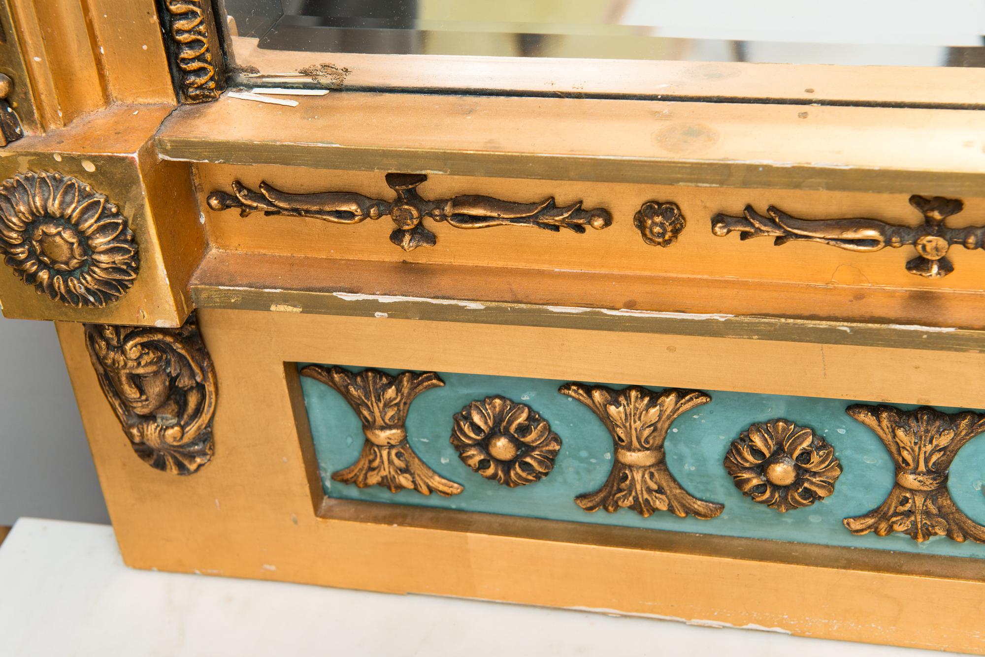 An early 20th century mirror with console table in late Gustavian style.