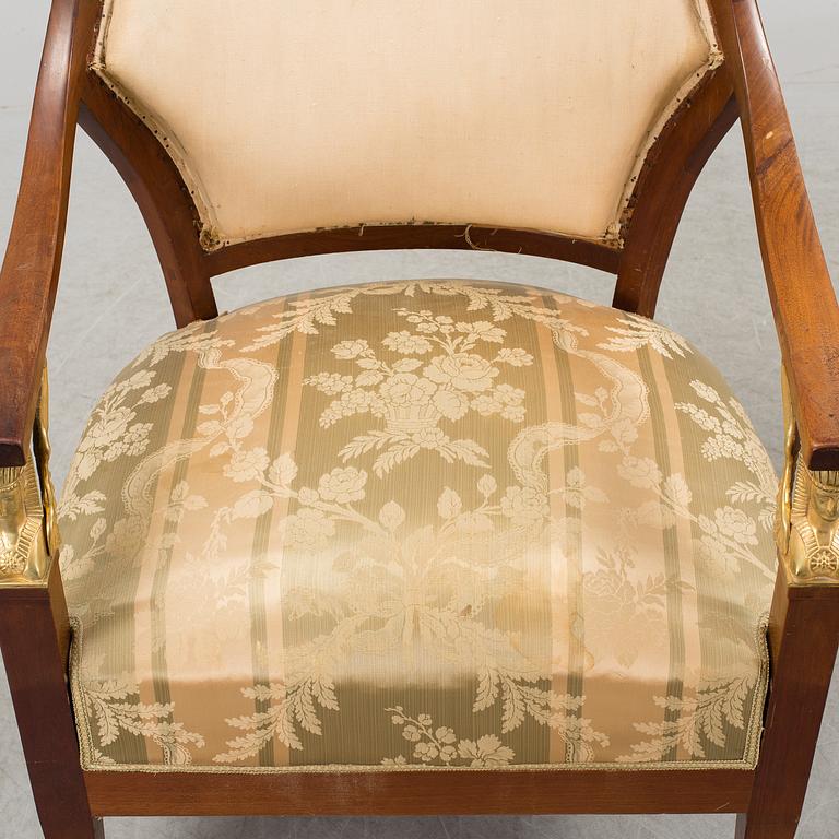 A pair of early 20th century Empire style armchairs.