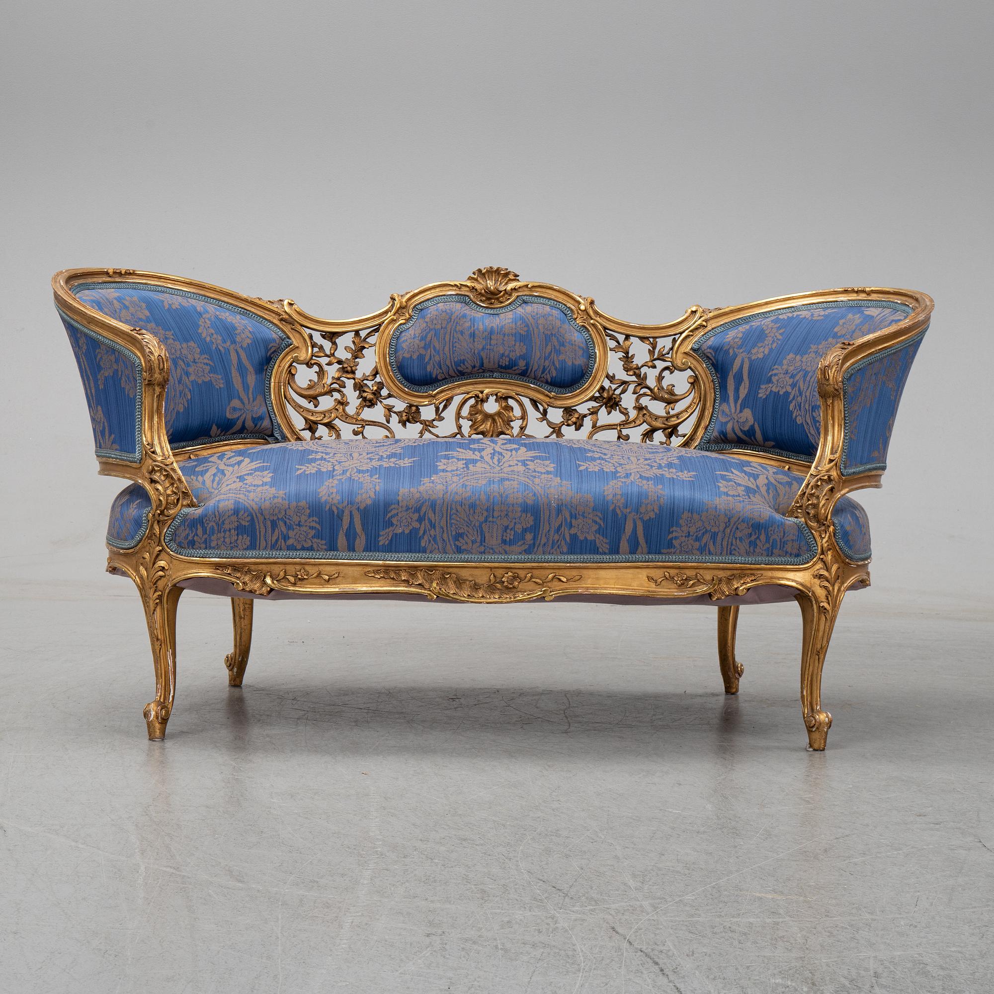 A Frennch 19th Century Louis XV style sofa.