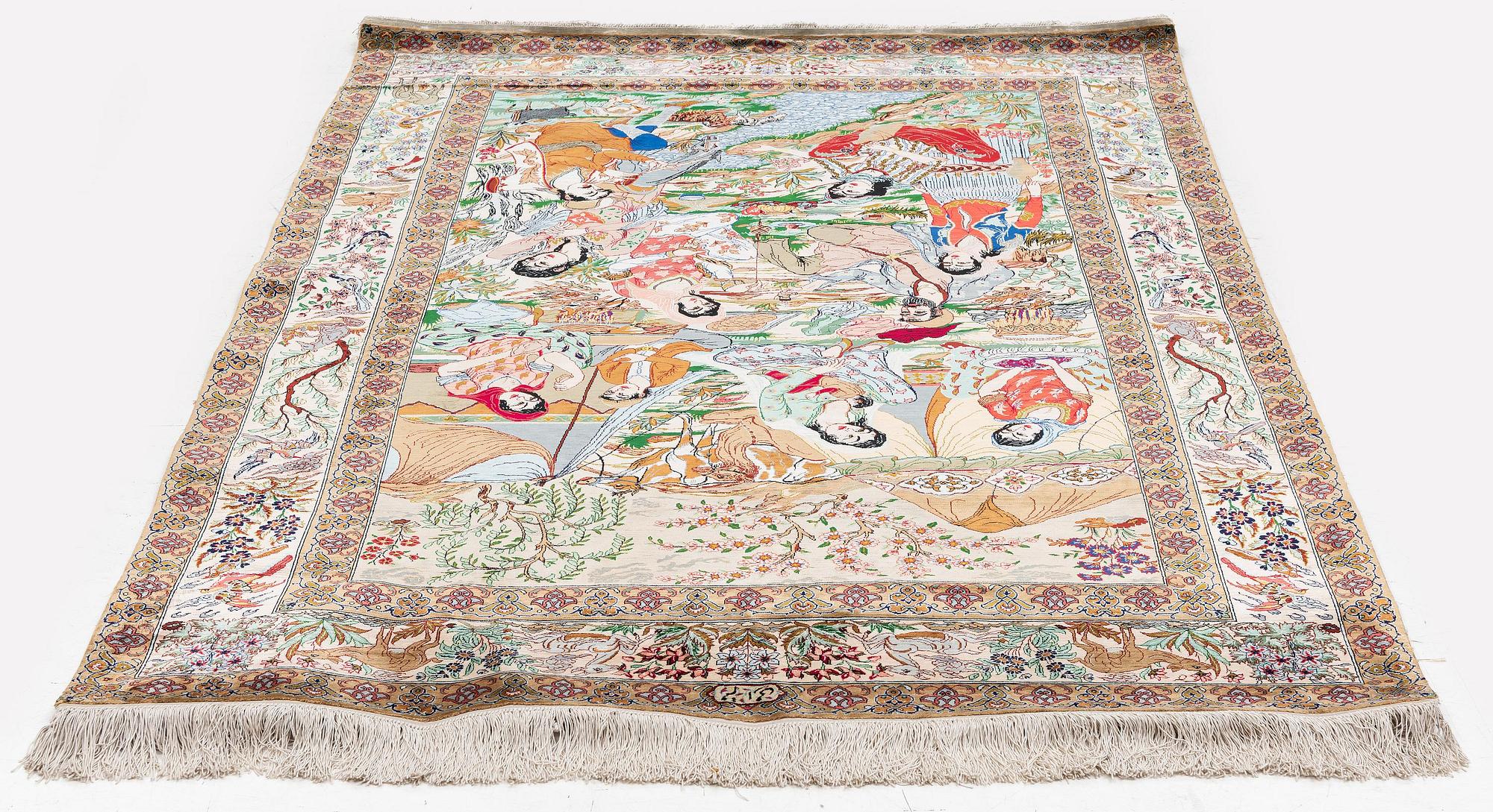 A silk Qum rug, Central Persia, signed, c. 135 x 208 cm.
