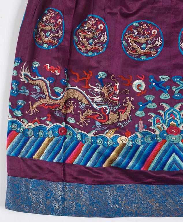 An embroidered silk skirt, Qing dynasty (1644-1912).