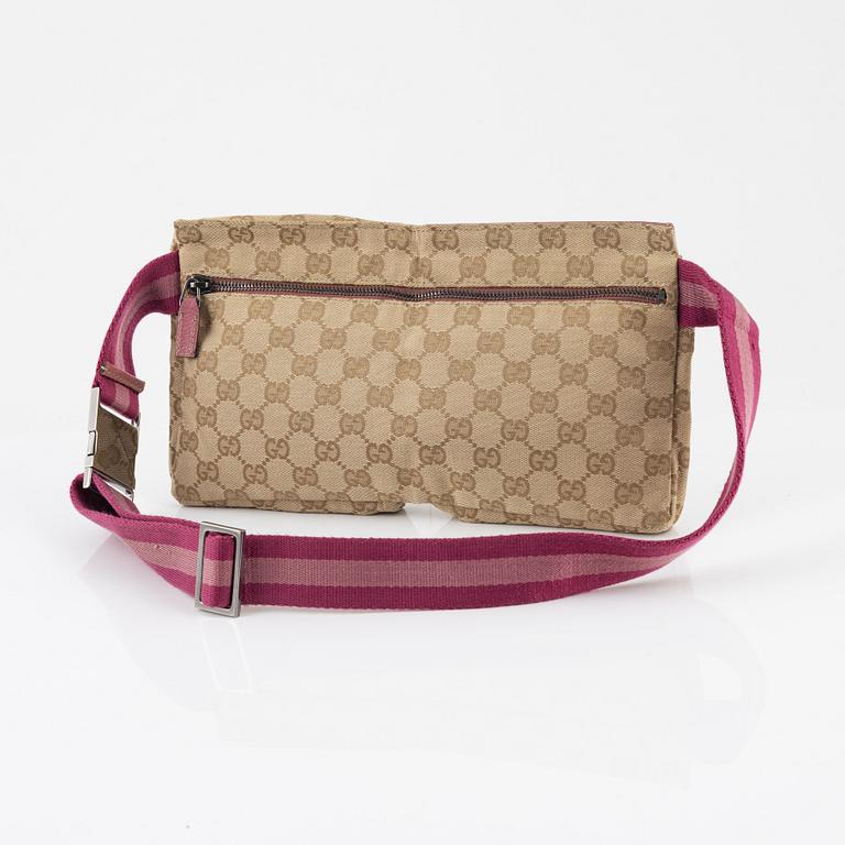 Gucci, a canvas beltbag.