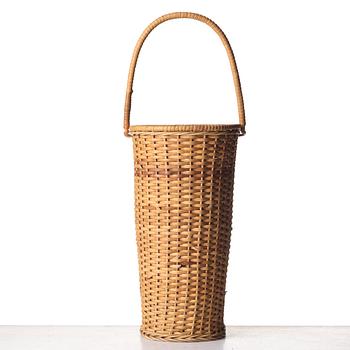 Firma Svenskt Tenn, a fretted rattan umbrella stand, mid 1900's, provenance Estrid Ericson.