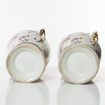 A pair of famille rose jars with gilded silver covers, Qing dynasty, Qianlong (1736-95).