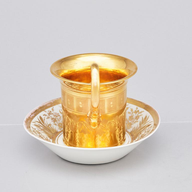 A German topographical cup with stand, 19th Century.
