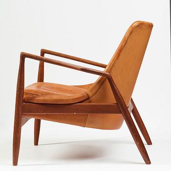 Ib Kofod-Larsen, a "Seal" teak and brown leather armchair, Olof Persson Möbler, Jönköping, Sweden 1950-60's.