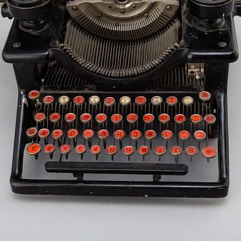 a Woodstock typewriter, early 20th century.