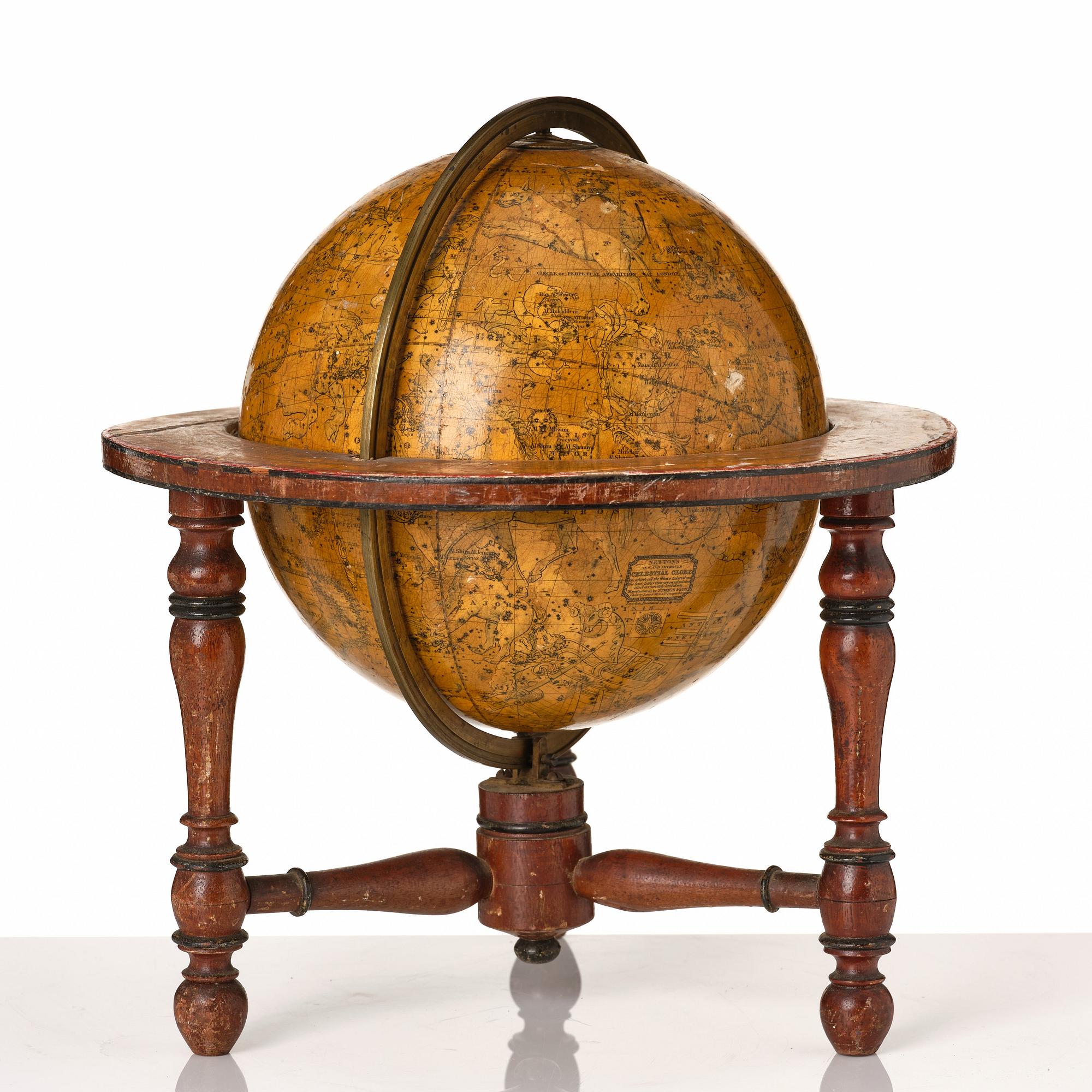 A celestial globe for table by Newton & son London 1860.