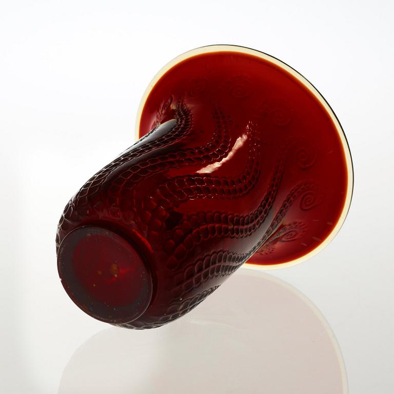 A René Lalique cast red glass 'Méduse' vase, France post 1921.