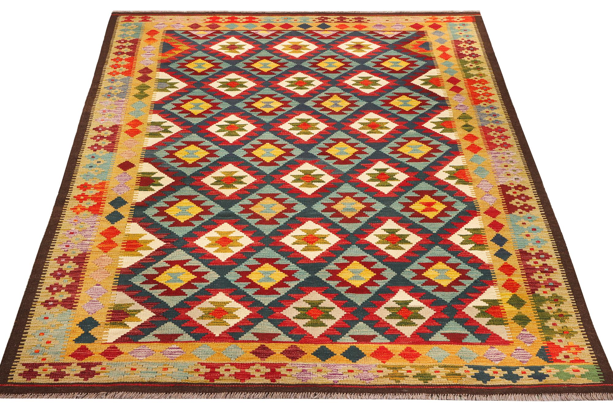 An Afghan Kelim carpet, c. 304 x 200 cm.