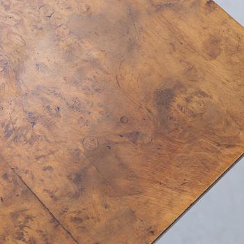 A late Gustavian burr-alder table, circa 1800.