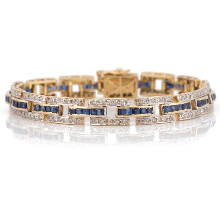 A bracelet set with diamonds and carré-cut sapphires.