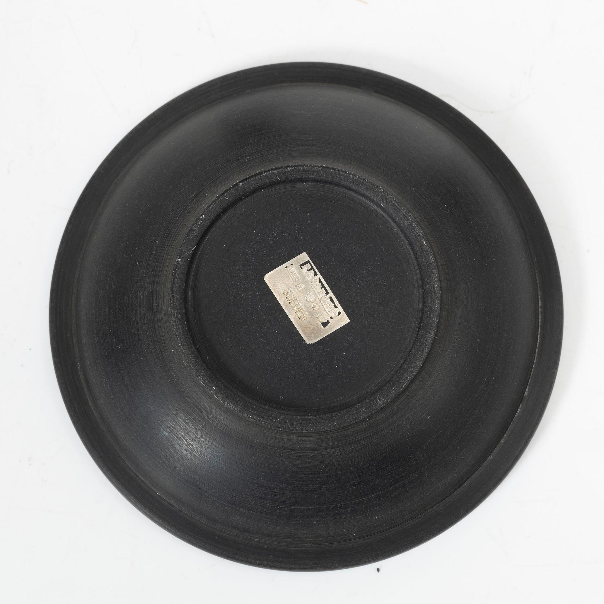 Five dishes, and one box with gaming chips, isolite with silver decor, Perstorp, Sweden, mid-20th century.