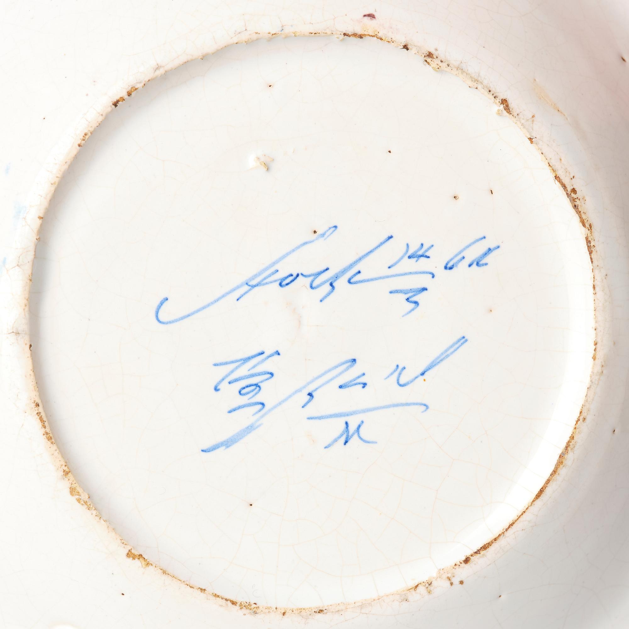 A Swedish faiance dish, Rörstrand Stockholm, dated 1761.