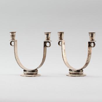 A pair of Gunlach Pedersen sterling candelabra, Georg Jensen, Copenhagen 1925-32, design nr 623.
