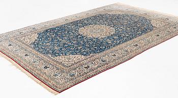 A semi-antique Nain Tusheshk, signed, ca 324 x 223 cm.
