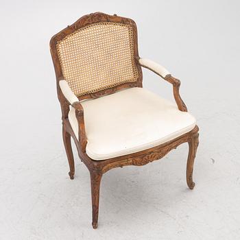 A French Louis XV armchair, mid 18th century.