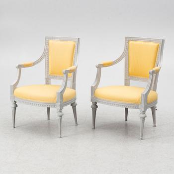 A pair of Gustavian open armchairs by L. Söderholm (master in Stockholm 1789-94).
