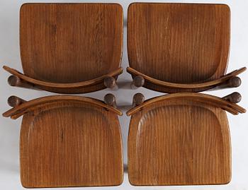 Axel Einar Hjorth, a set of four stained pine "Sandhamn" chairs, Nordiska Kompaniet, Sweden 1933.