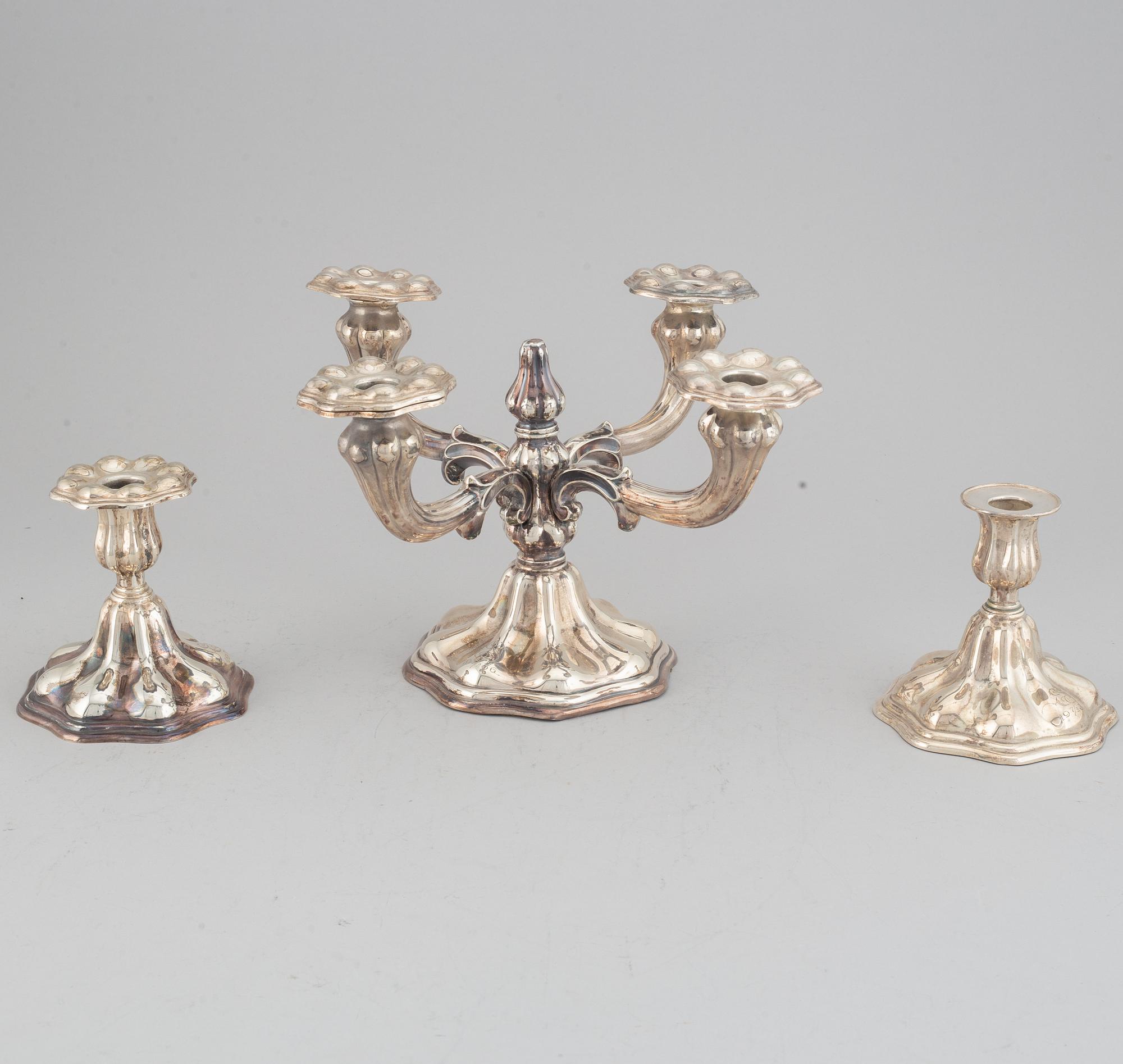 CG Hallberg, kandelaber samt ett par ljusstakar, silver, rokokostil, Stockholm, 1936 och 1935.