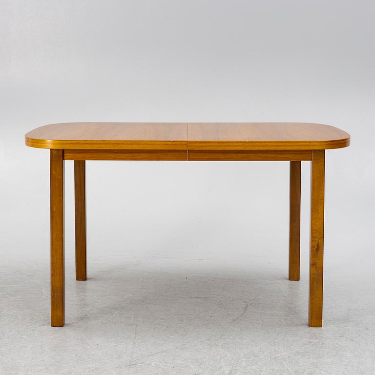 A dining table, 1950s/60s.