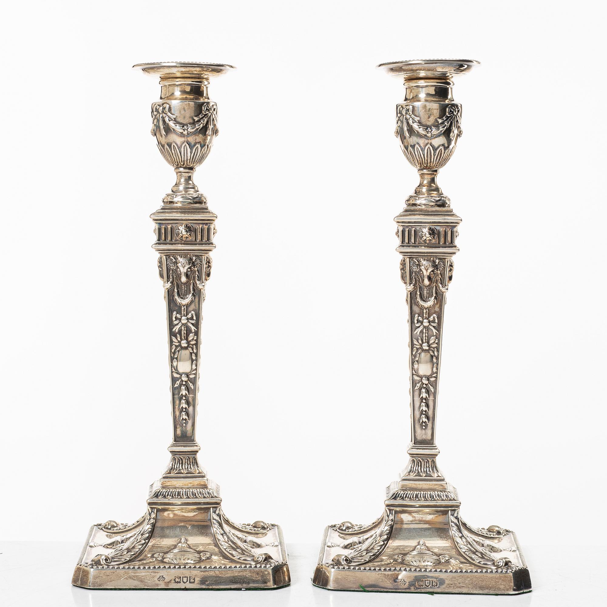 A pair of English silver candlesticks, mark of William Hutton & Sons Ltd, London 1902.
