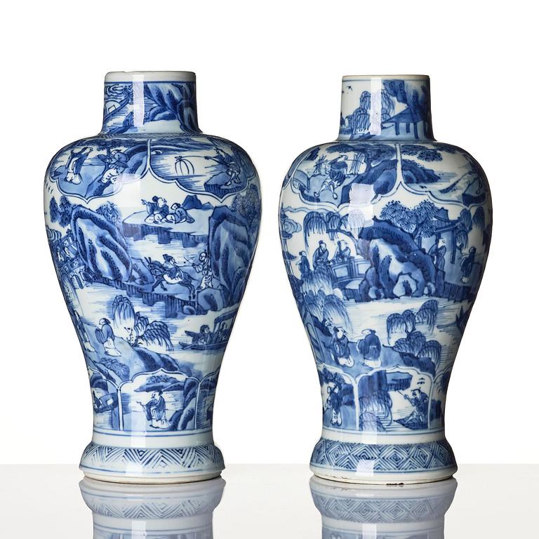 A pair of blue and white 'landscape' vases, Qing dynasty, Kangxi (1662-1722).