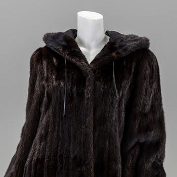 A mink coat by Saga Mink, in size 38/40.