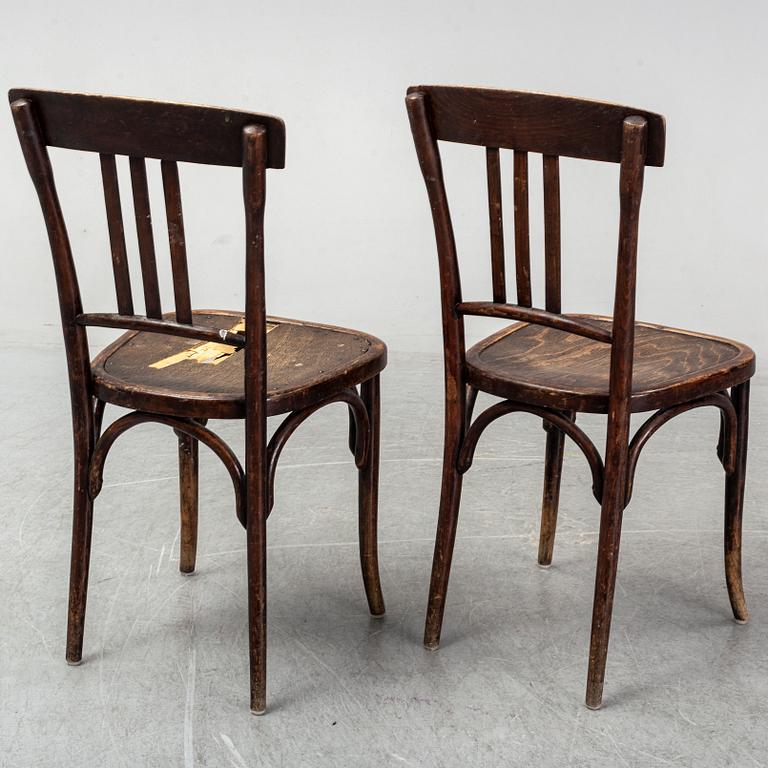 A matched set of four wooden chairs, first half of 20th Century.