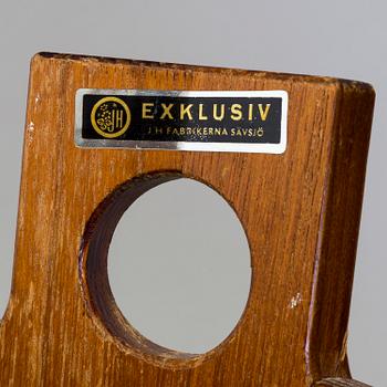 a pair of teak umbrella stands from the second half of the 20th century.