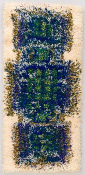 Terttu Tomero, a rya rug for Neovius 75-year anniversary model. Circa 140 x 65cm.