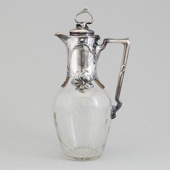 An Art Nouveau claret-jug, glass and silver plated metal, possibly Germany, c. 1900.