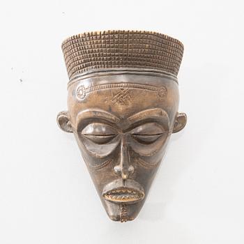 Dance mask "Mwana Pwo" Chokwe Congo 20th century.