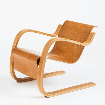 Alvar Aalto, a model 31 burled birch armchair, produced by O.y Huonekalu-ja Rakennustyötehdas, Finland or Aalto Design Hedemora.