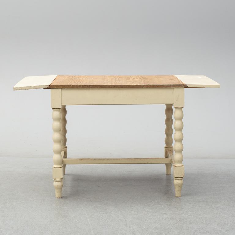 A set of table and two chairs, baroque-style, 20th century.