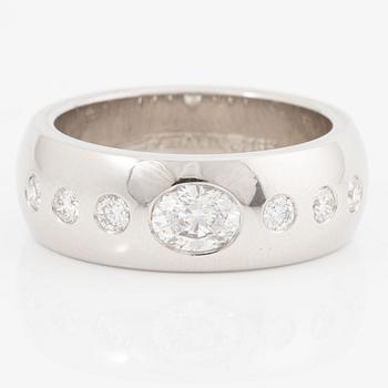 Ring, Schalins, 18K white gold with an oval-cut diamond and brilliant-cut diamonds.