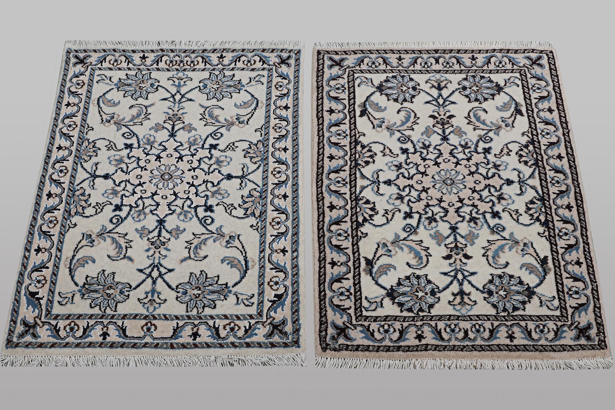 A pair of rugs, Nain, part silk, ca 90 x 60 cm & ca 90 x 60 cm.