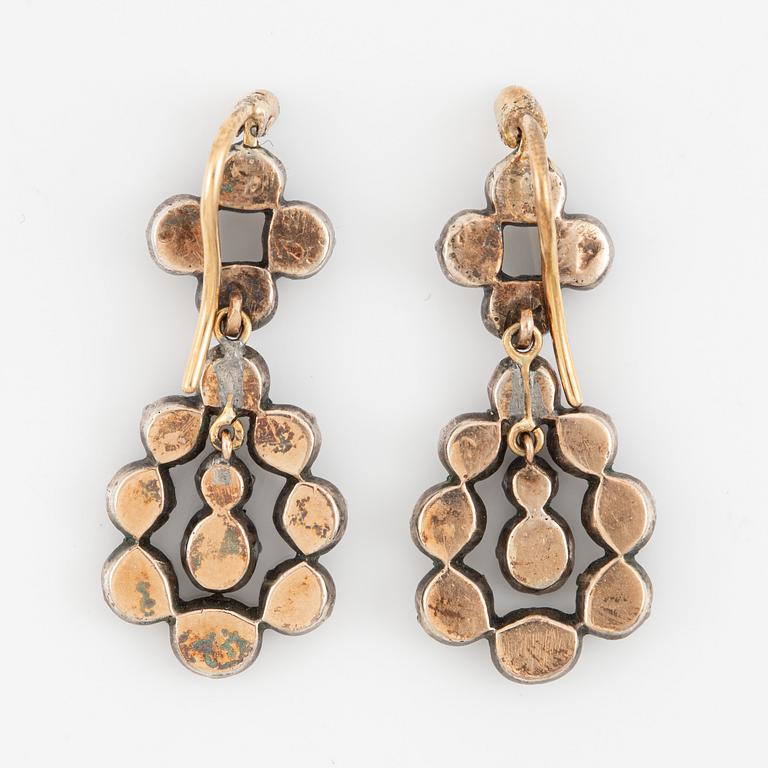 A pair of earrings in silver and 18K gold set with old-cut diamonds.