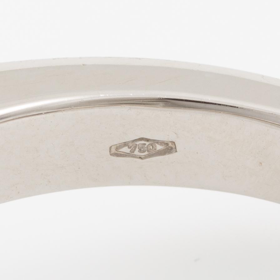 Ring, 18K white gold with sapphire and trapeze- and navette-cut diamonds.