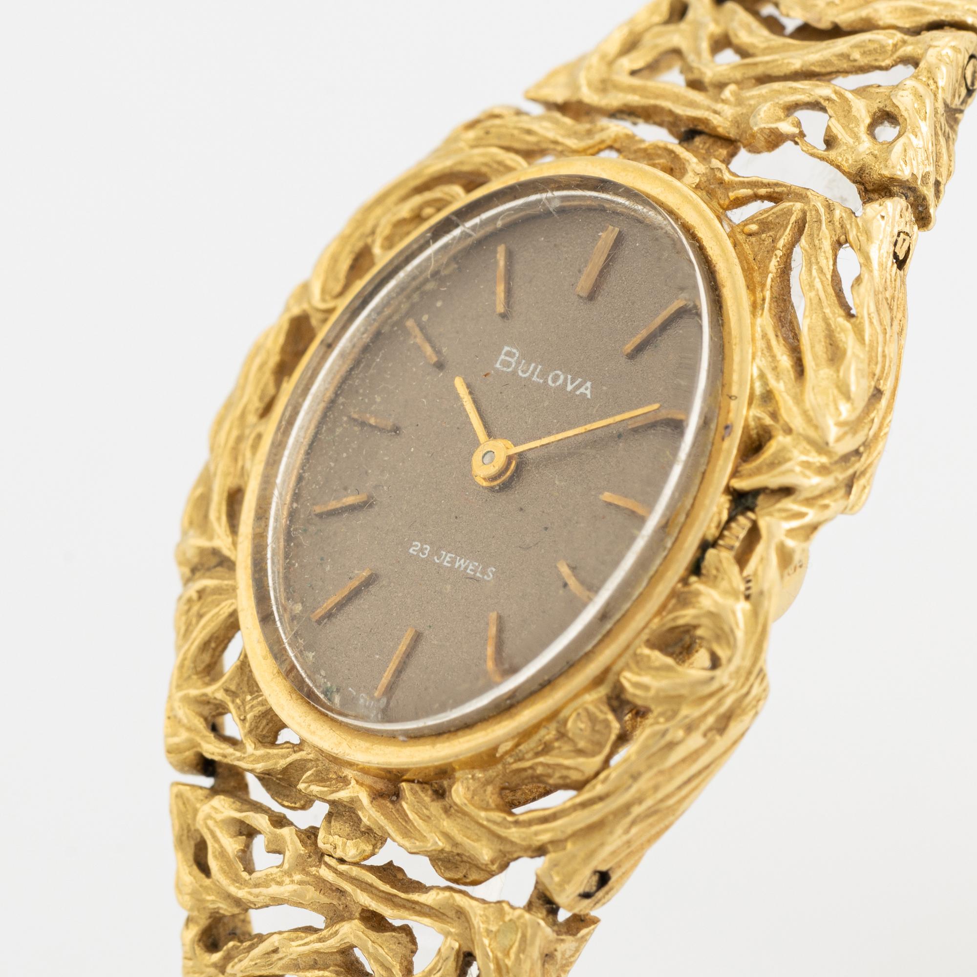 18K gold Bulova watch. Bukowskis